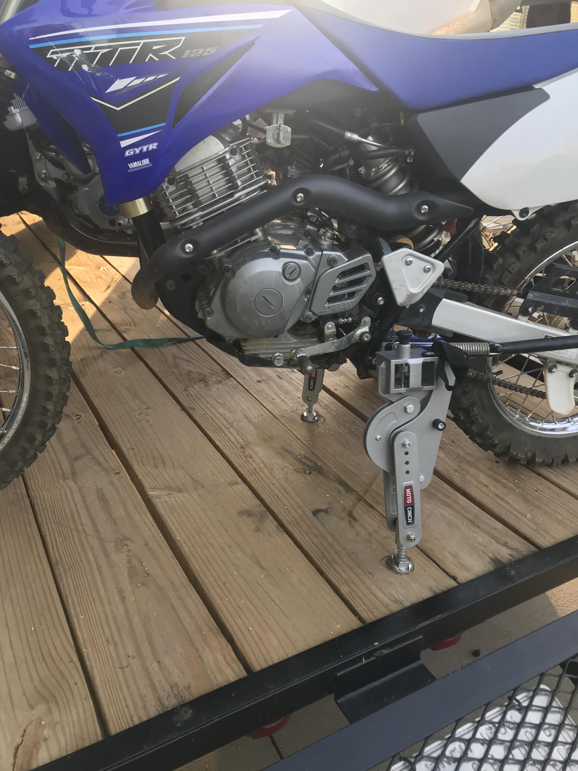 Moto Cinch motorcycle foot peg tie down system